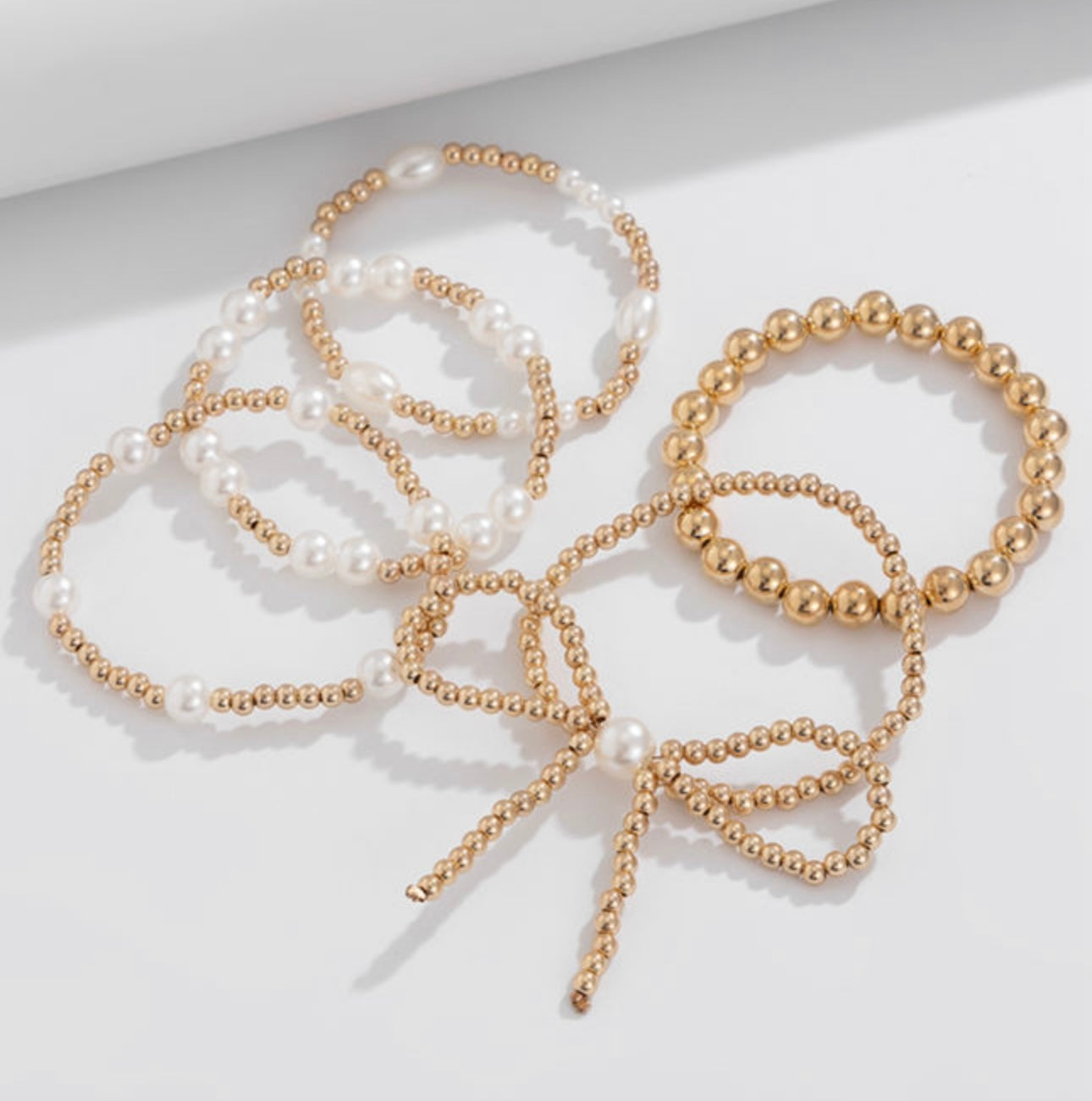 Gold and Bow Bracelet Stack